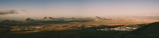Panoramic of the Island of Lanzarote from the volcano of Teguise during the sunrise, Canary Island - Photo, Image