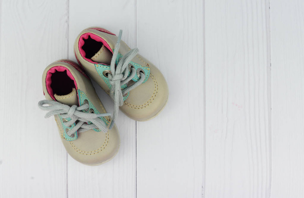 children's shoes gray boots on a background - Φωτογραφία, εικόνα