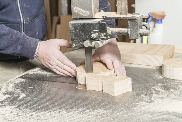 Worker man concept. Male carpenter working in his carpentry workshop. - Foto, imagen