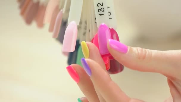 Woman hand choosing nail color. - Footage, Video