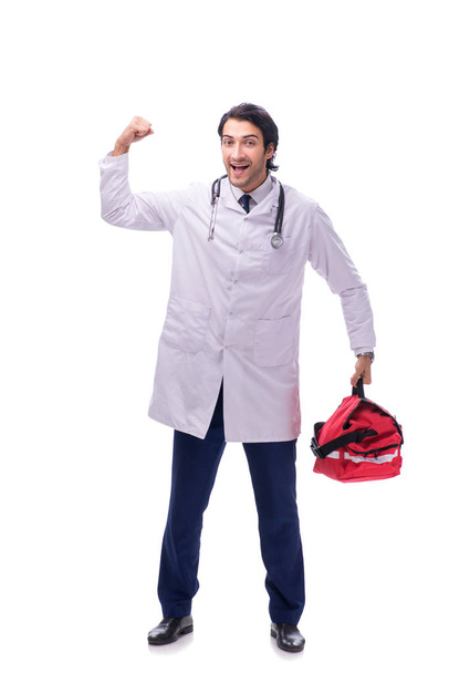 Joven médico paramédico masculino aislado en blanco
  - Foto, Imagen