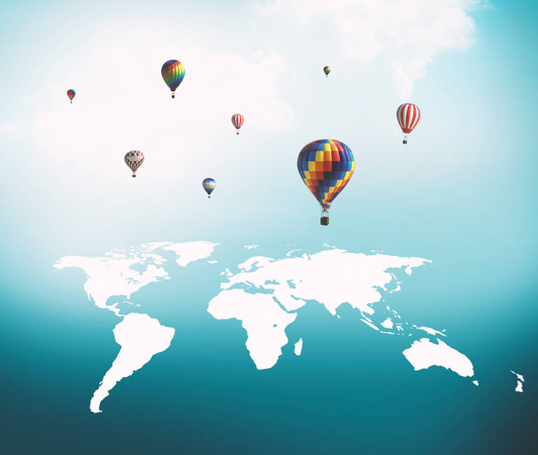 Hot air balloons flying over world map. - Photo, Image