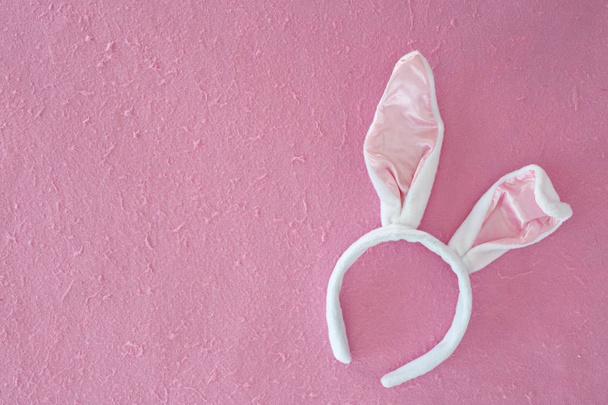 Happy bunny ears easter day Pink mulberry paper background, Copy space, with place for text. Spring concept. - Photo, Image