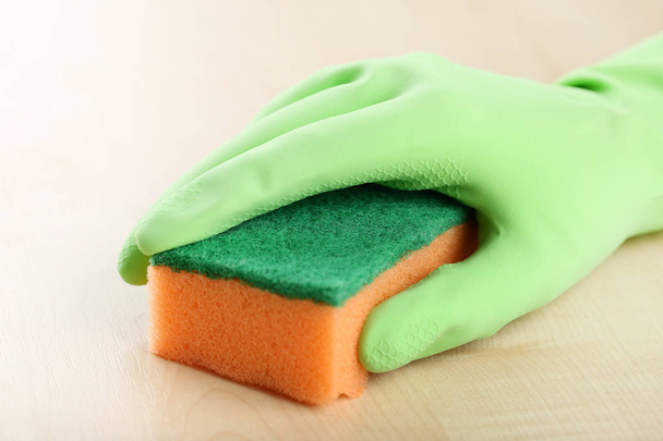 Hand in glove cleaning kitchen table - Foto, Imagem