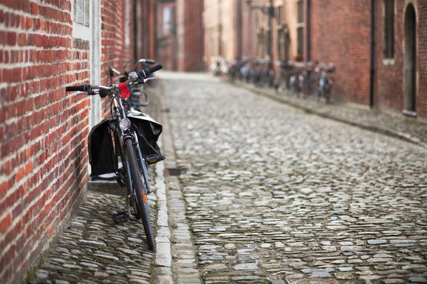 Bicycles on medieval street - Φωτογραφία, εικόνα