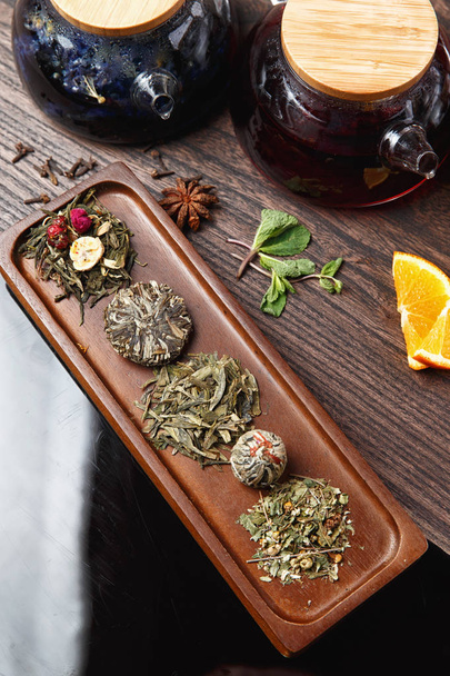 various teas on wooden panels. selective focus - 写真・画像