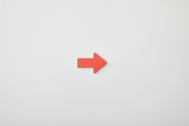 top view of red horizontal pointer on grey background - Photo, Image