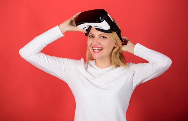 Woman excited using 3d goggles. The woman with glasses of virtual reality. Excited smiling businesswoman wearing virtual reality glasses. VR in hands. - Photo, Image