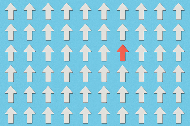 top view of rows with white pointers and red arrow on blue background - Photo, Image