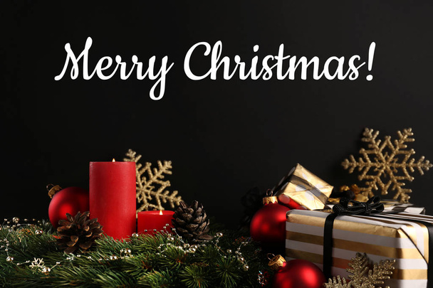 Beautiful decorations with text MERRY CHRISTMAS on dark background - Photo, Image