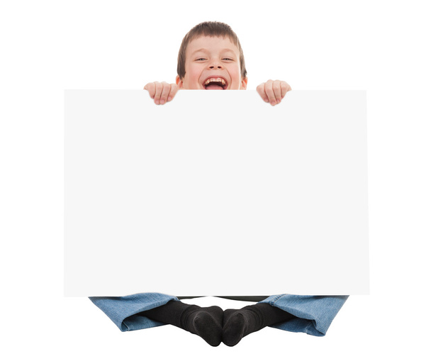 boy with blank paper sheet - Foto, Imagen