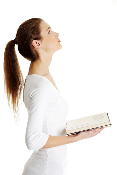 Teen woman reading book - Фото, зображення