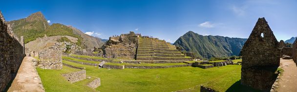 Machu picchu at late noon on a bright day - Photo, Image