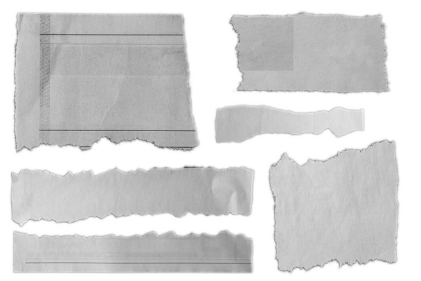 Pieces of torn paper on plain background  - Photo, Image