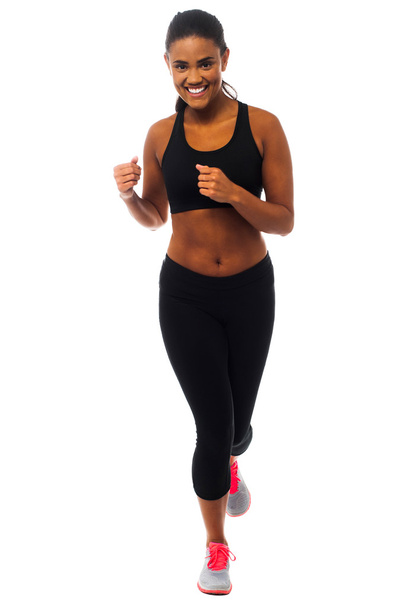 Fit female jogger, studio shot - Фото, изображение