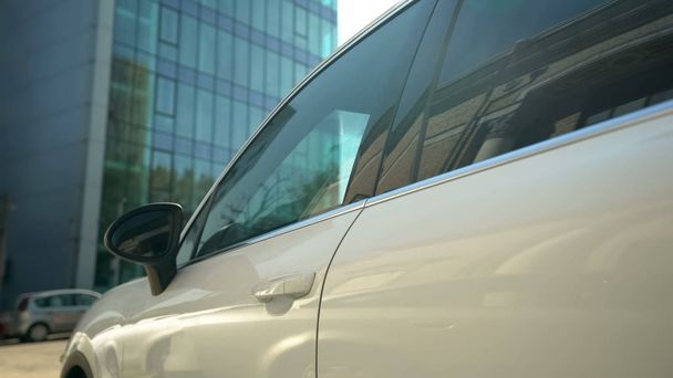 Company suv standing on parking lot, business car, renting or leasing system - 写真・画像