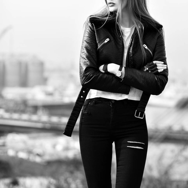 young beautiful woman in leather jacket   posing - Фото, изображение