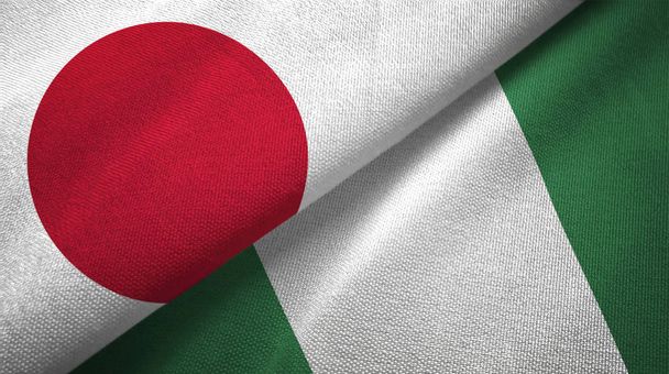 Japan and Nigeria flags together textile cloth, fabric texture - Photo, Image