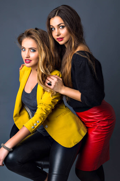 Close up fashion lifestyle portrait of two young hipster girls - Photo, Image