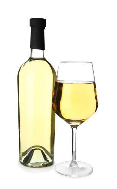 Bottle and glass of tasty wine on white background - Foto, afbeelding