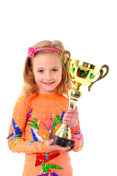 Little girl holding sport cup - Zdjęcie, obraz