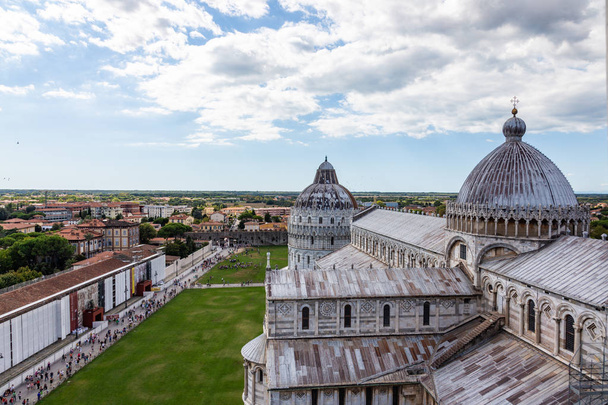 View of the Cathedral of Pisa from the top of the Famous Leaning Tower in the city of Pisa, Italy - Foto, afbeelding