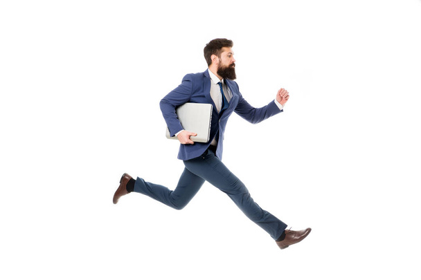 Towards success. Inspiring innovations. Businessman inspired guy feel powerful going to change world. Man inspired hold laptop while jump. Follow your dream. Keep moving. Inspired for start up. - Photo, image