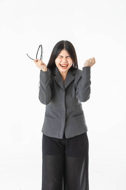 Half-length studio portrait of young Asian woman,looks painfully screaming with stress, on isolated white background - Foto, immagini