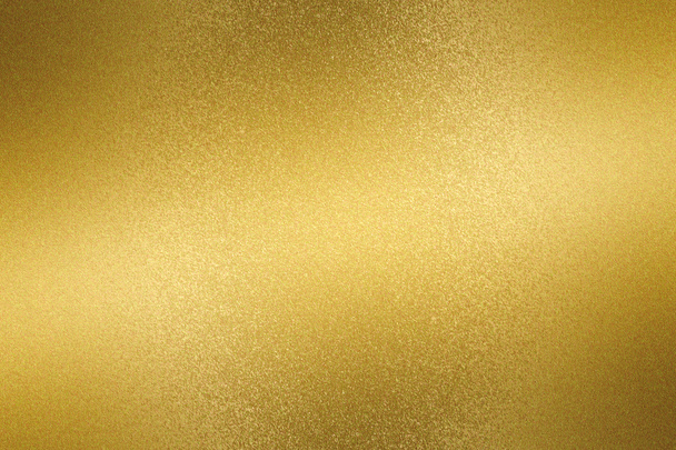 Glowing gold metallic plate surface, abstract background - Photo, Image