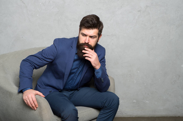 Male fashion in business office, copy space. Bearded man. Mature hipster with beard. Business. Modern businessman. Confident brutal man. Businessman in formal fashion suit. Man. Business fashion look - Photo, image