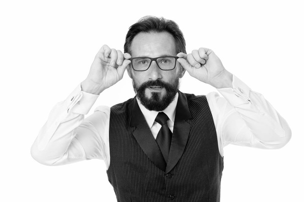 Man bearded wear eyeglasses isolated white. Businessman teacher adjust eyeglasses. Take look concept. Business analysis and analytical skills. Eyeglasses optics and vision check. Take look carefully - 写真・画像