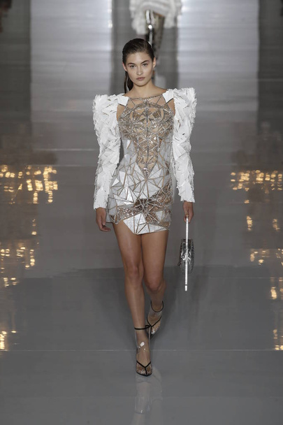 PARIS, FRANCE - SEPTEMBER 28: Grace Elizabeth walks the runway during the Balmain show as part of the Paris Fashion Week Womenswear Spring/Summer 2019 on September 28, 2018 in Paris, France. - Photo, Image