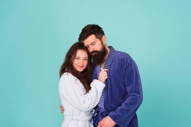 Sleepy man embrace his girl. Bearded man and woman in robe pajama. Couple in love. sleepy family. Wake up morning. Love and romance. Happy family in morning. couple looks sleepy in morning. Insomnia - Photo, Image