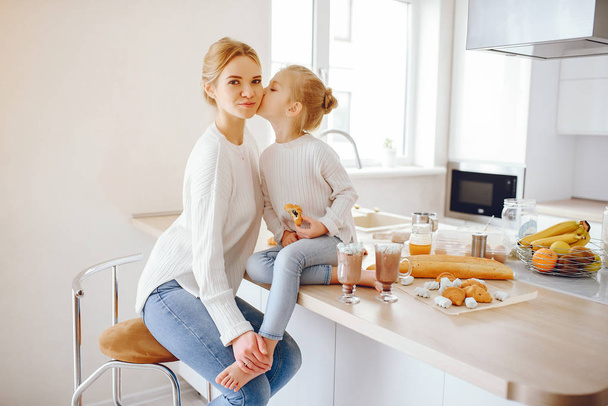 mother with cute blond daughter - 写真・画像