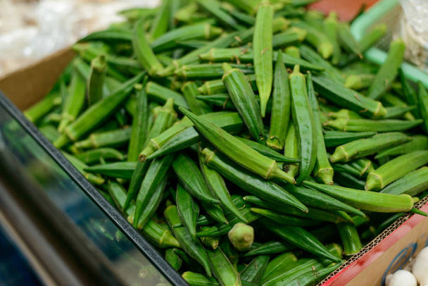 Tray of fresh okra pods - Photo, Image