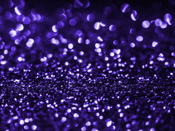 Background sequin.  Violet background. Holiday abstract glitter background with blinking lights. Fabric sequins in bright colors. Fashion fabric glitter, sequins. Defocused.  - Photo, Image
