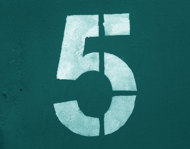 Number 5 in stencil on metal wall in cyan tone. Abstract background and texture for design. - Photo, Image