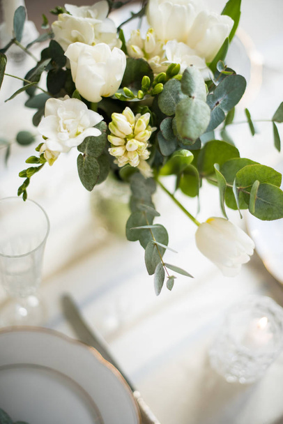 Beautiful festive table setting with elegant white flowers and cutlery, dinner table decoration  - Fotoğraf, Görsel