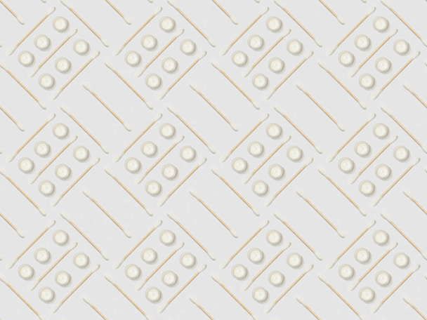 ear sticks and cosmetic cream on grey background, seamless background pattern - Фото, зображення