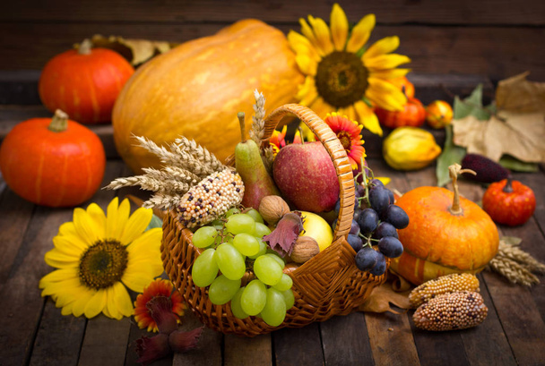 close up view of autumn harvest on wooden table - Fotó, kép