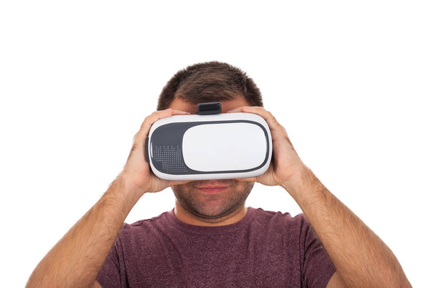 Picture of a young man wearing VR headset - Foto, immagini