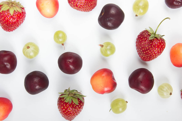 Various summer Fresh berries in a white background.. Antioxidants, detox diet, organic fruits - Фото, зображення