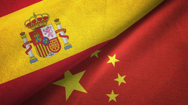 Spain and China flags together relations textile cloth, fabric texture - Photo, Image
