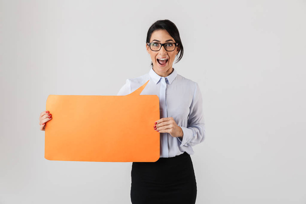 Image of caucasian office woman wearing eyeglasses holding yellow copyspace placard isolated over white background - Photo, image