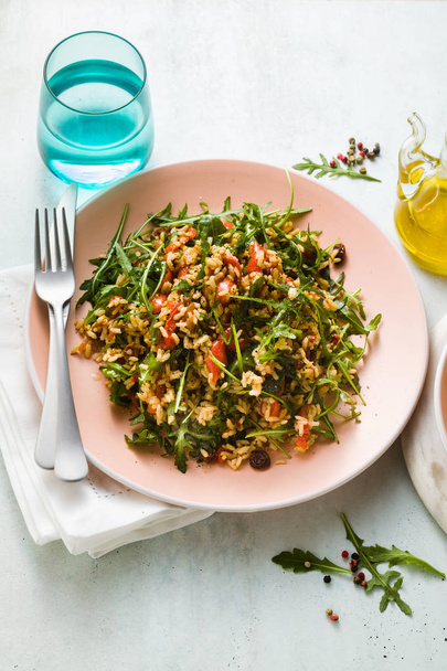 rice salad with baked bell peppers, arugula, olives and capers. Healthy vegan spring recipe for the whole family or party - Fotó, kép