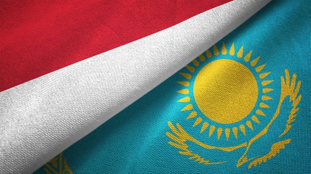 Indonesia and Kazakhstan flags together textile cloth, fabric texture - Photo, Image
