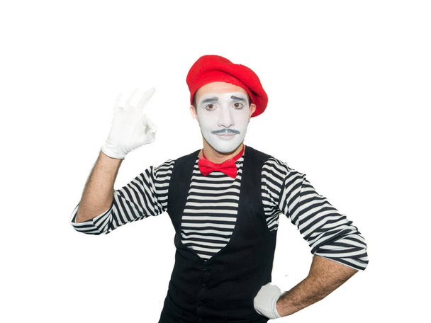 Mime man showing ok sign at camera. Emotions and feelings concept. isolated on white background - Foto, afbeelding
