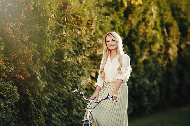 portrait of pretty sexy girl  posing with vintage  retro bicycle  - Fotografie, Obrázek