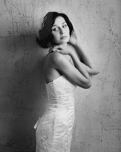 Portrait of a beautiful young woman in retro style - Fotografie, Obrázek