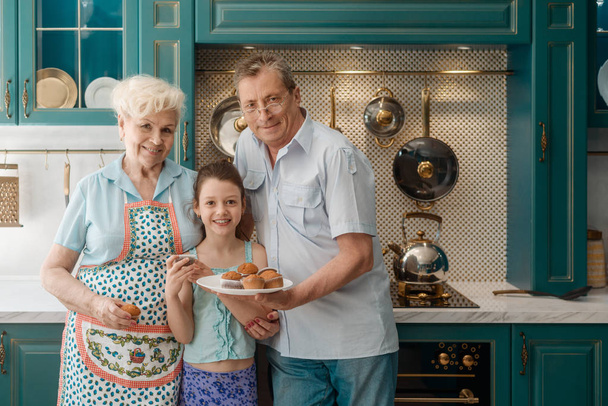 Young girl and her grandparents - Foto, Bild